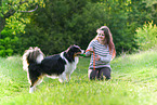 woman with Australian Shepherd