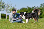 woman with Australian Shepherd