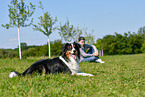 man with Australian Shepherd