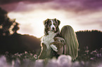woman with Australian Shepherd