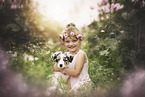 girl with Australian Shepherd Puppy