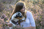 woman and Australian Shepherd