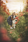 girl and Australian Shepherd