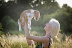 woman with young Beagle