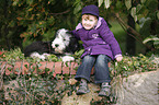 girl with Bearded Collie