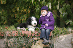 girl with Bearded Collie