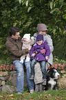 family with Bearded Collie