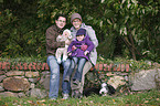 family with Bearded Collie