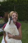 woman with White Swiss Shepherd