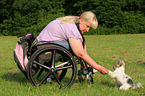 woman and Biewer Yorkshire Terrier