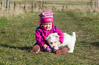 child and Bolonka zwetna