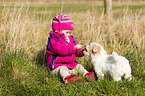 child and Bolonka zwetna