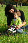 humans with Boston Terrier Puppy