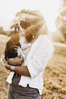 young woman with Cavalier King Charles Spaniel