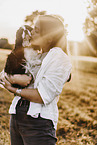 young woman with Cavalier King Charles Spaniel