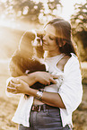 young woman with Cavalier King Charles Spaniel