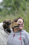 woman and longhaired collie