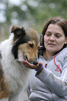 woman and longhaired collie
