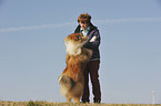 woman and longhaired Collie