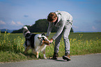 man and longhaired Collie