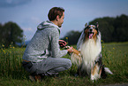 man and longhaired Collie