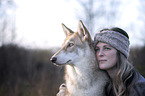 woman with Czechoslovakian Wolfdog