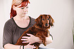 woman with dachshund