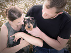 woman, man and Dachshund