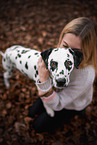 woman and Dalmatian