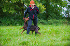 woman and Doberman Pinscher