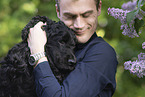 man with English Cocker Spaniel