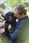 man with English Cocker Spaniel