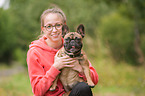 woman and French Bulldog