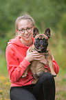 woman and French Bulldog