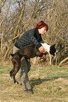 woman and German Boxer