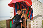 woman and German Boxer