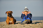 boy and German Boxer