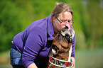 woman and German Boxer