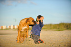 Child and German Boxer