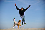 man and 2 dogs