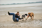 woman and 2 dogs