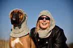 woman and German Boxer