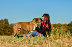 woman and German Boxer