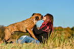 woman and German Boxer