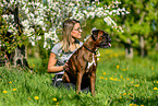 woman with German Boxer