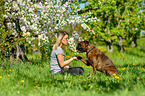 woman with German Boxer