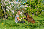 woman with German Boxer