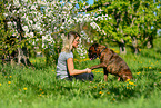 woman with German Boxer