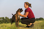 woman with German Boxer