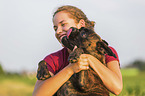 woman with German Boxer